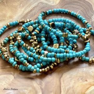 Bracelet en perles de verre et hematite montés sur elastique